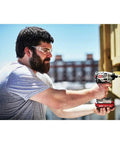 Man using 20V Max Impact Driver With Battery And Charger Included One Quarter Inch Chuck 2700 RPM Brushless Motor on wood