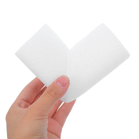 Hand holding Epe Foam Corner Protectors Pack Of 12 White Lightweight Multi Purpose Edge Cushions for furniture protection