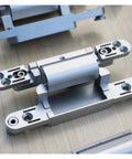 Rebated Door Hinge For 180 Degree Opening, Hidden Zinc Alloy Door Hardware on wooden surface, durable and sleek.