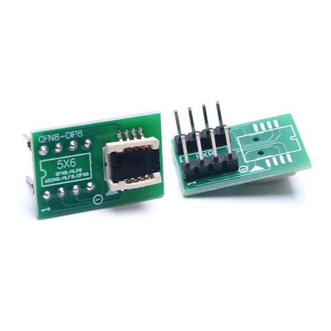 Two green DFN8 WSON8 MLF8 MLP8 QFN8 to DIP8 socket adapters for IC chips, showing pin layout and tape-free connection design.