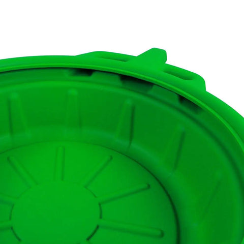 Close-up of green portable oil drain pan with large opening and anti-splash lip in durable polyethylene for cars and fluids anti freeze.
