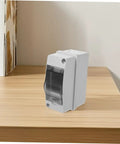 Weatherproof Electrical Junction Box With Transparent Cover on a wooden surface, IP65 rated for outdoor industrial control panels and power enclosures