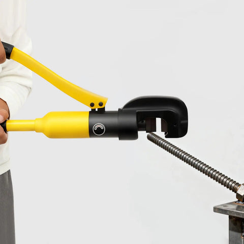 Heavy Duty Hydraulic Rebar Cutter 13 Ton Cuts Up To 22mm Steel Rods held by a user cutting through steel rebar.