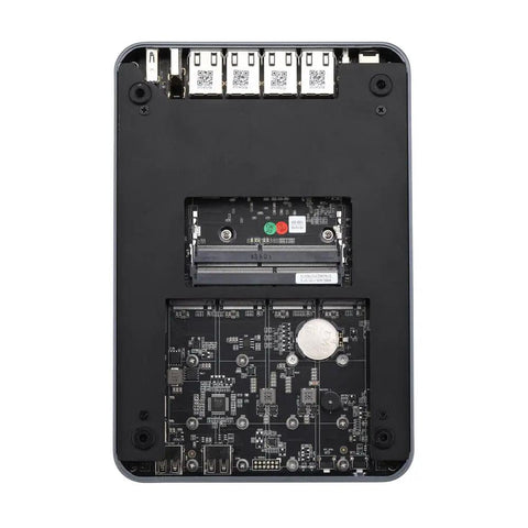Compact Intel Core I5 1135G7 Mini PC With 16GB DDR4 Ram And 128GB M2 Ssd bottom view showing internal components and ports.