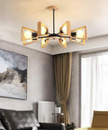 Modern Metal Pendant Chandelier With Five E27 Sockets And Compatible Slim Led Fixtures Sleek Black Finish in living area.