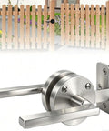 Heavy Double Side Gate Latch for Wooden Fence, Silver installed on a wooden fence with a double-sided handle design.