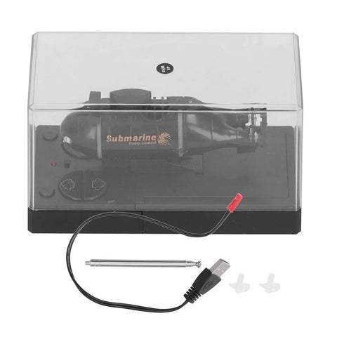 RC Submarine Toy For Teens And Up Mini Electric Diving Boat in packaging with USB cord and accessories, black color.