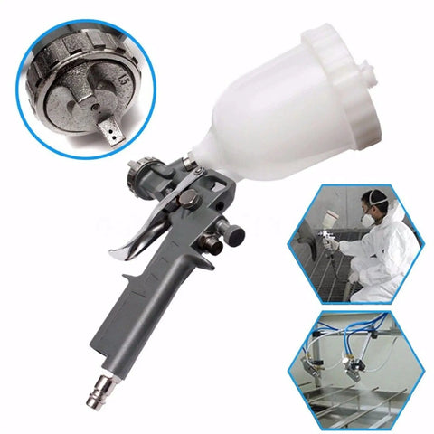 Top Shelf 600 ML Gravity Feed Paint Spray Gun With Adjustable Fan Width And Precision Flow Control For Slick Water Based Base Coats On Car Auto Body Restoration close-up showing adjustable controls and feed cup.