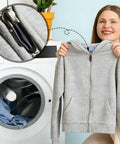Woman holding gray hoodie beside washing machine; inset shows silicone zipper protector installed on hoodie zipper.