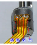 Close-up of DC 5V 30mm Linear Actuator 8mm Stroke 2 Phase 4 Wire with visible screw drive and labeled wires A1, B1, A2, B2 for precision motion.