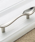Spoon-shaped pull from 3 Piece Funny Knife Spoon Fork Shape Cabinet Pulls Set For Kitchen Cupboard And Drawer Handles With 3 Inch Center Hole Zinc Alloy