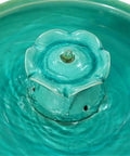 Close-up of 22 Inch Ceramic Bird Bath Fountain With Lotus Design in glazed aqua green, showing lotus detail for garden decor.