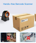 Hands Free 1D 2D Barcode Scanner With QR Reader Plug And Play For Desktop POS Systems Screen Scanning Supported Perfect For Warehouse Supermarket Retail Store And Bookstore Inventory Management next to cardboard box