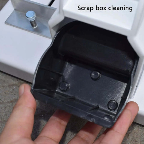 Close-up of scrap box cleaning on Heavy Duty Portable Handheld Paper Hole Punch With 4mm 5mm 6mm 7mm 8mm Holes.