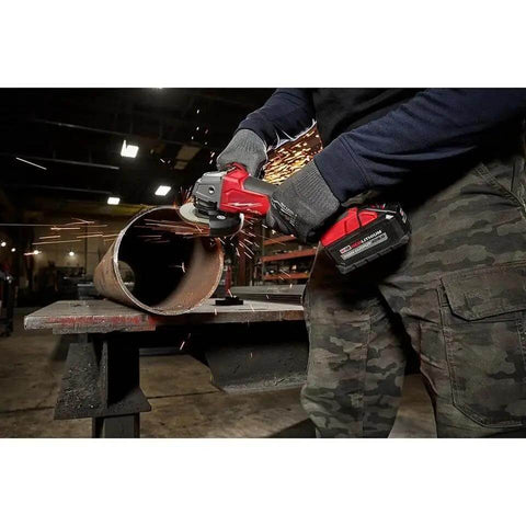Hardcore Brushless Angle Grinder Kit For Milwaukee M18 Fuel Batteries 4 Inch 5 Inch Rapid Metal Cutting And Grinding Tool in action, cutting metal pipe.