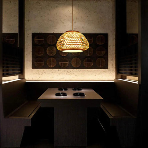 Retro Bamboo Dome Flush Mount Ceiling Light With Adjustable Cord Up To 23.62 Inches illuminating a dining area