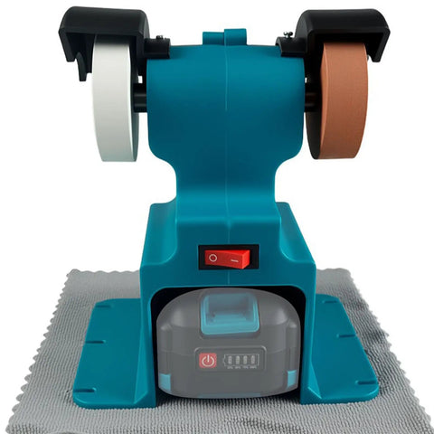Hamwesh Mini Bench Grinder, 200W Cordless Electric Sander With 7000Rpm Speed on a work surface, showcasing grinding wheels and charger.