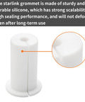 Close-up of Slick Starlink Cable Routing Kit grommet, white silicone, durable for sealing one-inch wall holes.