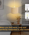 Plug In Pendant Light With 15 Ft Clear Cord Beige Linen Shade On Off Switch Hanging Ceiling Light For Bedroom Living Room Dining Area Cozy Vibe And Easy Height Adjustment illuminating a bedroom.