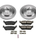 PowerStop rear brake kit: two silver rotors, four ceramic brake pads, mounting clips, and a lubricant sachet