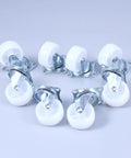 8 Pcs Inch Swivel PP Caster Wheels for Furniture and Workbench, white plastic wheels with metal brackets, designed for smooth rolling.