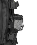 Side view of black heavy duty tactical backpack for men waterproof military style daypack with MOLLE system and mesh pocket detail