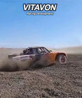 RC truck racing on dirt track demonstrating planetary gears housing for UDR Traxxas Unlimited Desert Racer 1to7