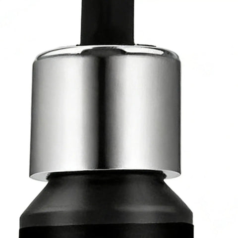 Close-up of Glass Repair Liquid Universal Quick Fix For Screens And Glass Cracks bottle cap and applicator.