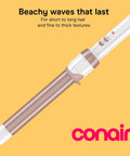 Double Ceramic One Inch Clamp Free Curling Wand For Effortless Beachy Waves with cream barrel and buttons on handle