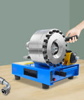 Beast Of A Handheld Hydraulic Hose Crimper With 8 Interchangeable Dies, tool in use on table, rotary micrometer precision
