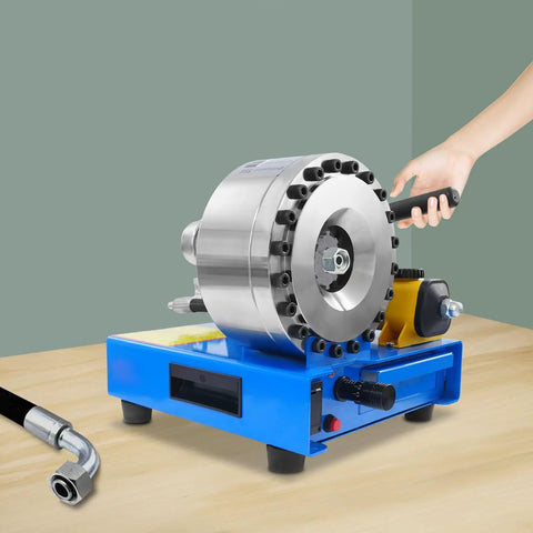 Beast Of A Handheld Hydraulic Hose Crimper With 8 Interchangeable Dies, tool in use on table, rotary micrometer precision