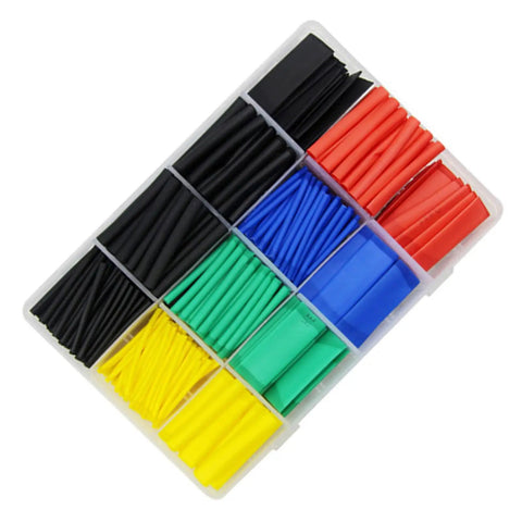 Top Quality Heat Shrink Tubing Kit With Assorted Sizes And Vibrant Colors For Superior Electrical Insulation Wire Repairs And Mechanical Protection Perfect For Electricians And DIYers Looking To Get Job Done Right Fast. assorted heat shrink tubing kit in clear storage case, black red blue yellow green