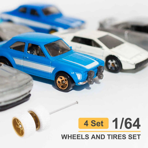 Four Pack One Sixty Fourth Scale Wheels And Tires Set With Real Riders Rims In White With Gold Seven Spoke Design Includes Axles For RC Diecast Cars And DIY Models Eleven X Five Point Two Millimeter Upgrade Kit For Custom Builds next to toy cars