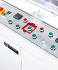 Control panel with big transparent emergency stop button cover with removable base box type push switch protector in industrial setting.