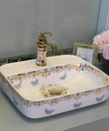 USZWBY Bathroom Sink, Countertop Basin Ceramic Ceramic Countertop Sink, Art Sink, square ivory sink with floral design and gold accents.