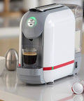 Compact Capsule Espresso Machine For Home And Office, Automatic Mini Coffee Maker With 20 Bar Pressure, 500ml Water Tank, 30ml And 60ml Shots, One Touch Brews on kitchen counter