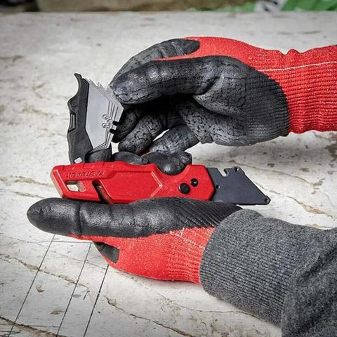 Beefy High Carbon Steel Replacement Blades For Fastback Folding Utility Knives, user changing blade with red handle knife.