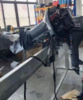 40 HP 2 Stroke Outboard Motor With Electric Start And Hydraulic Lift Reliable Marine Engine For Small To Medium Boats Dinghies And Inflatable Watercraft in workshop