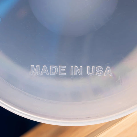Close-up of "Made in USA" label on the bottom of a translucent 64oz Half Gallon Measure Pitcher With Conversion Chart Heavy Duty Food Grade Polypropylene BPA Free Stain Resistant Translucent For Easy View Of Contents Dishwasher Safe Microwave Safe Great For Lawn Pool Spa Agriculture Home Hobbies Lye Cooking