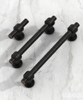 Oil Rubbed Bronze Cabinet Knobs 1.9 Inch 49mm Solid Straight Bar Hardware 10 Pack on marble surface