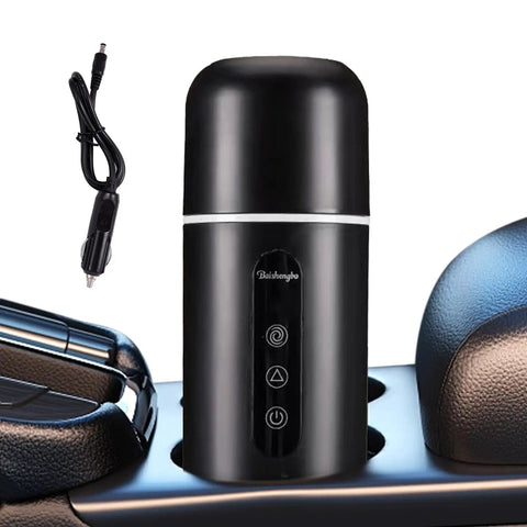 On The Go Electric Travel Mug With Fast Heating Element And Built In Magnetic Stirrer, black stainless steel mug in car cup holder.