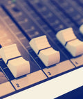 Close-up of DJ mixing board with Console Labeling Tape 1 Inch Wide 54.7 Yard Roll Clean Writable Flatback Paper White Adhesive Tape Removable No Residue