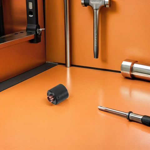 High Performance Plasma Cutter Start Cartridge Consumable With Circuit Protection For Durable Torch on orange workbench.