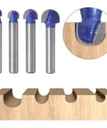 Core Box Router Bit Set Four Pieces Pro Grade With One Quarter Inch Shank And Cutting Diameters Of One Quarter, Five Sixteenths, Three Eighths, And One Half Inch For Beading, Fluting, Cove, And Ornamentation On Plywoods And Hardwoods displayed with sample cuts in wood.