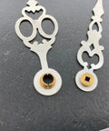 Close-up of Brass Clock Hands Replacement Kit For 7 Inch Dial NOS DIY Clock Assembly showing detailed design and mounting holes.