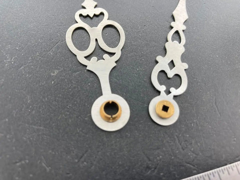 Close-up of Brass Clock Hands Replacement Kit For 7 Inch Dial NOS DIY Clock Assembly showing detailed design and mounting holes.