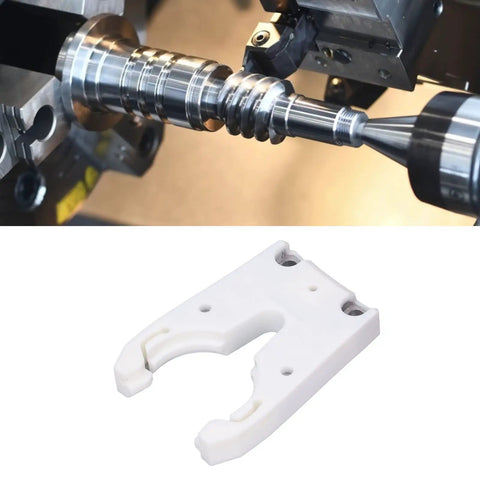 Heavy Duty Automatic Tool Holder Clamp For CNC Machines, tough ABS plastic clamp showing secure grip with engraved part.