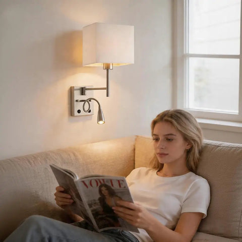 Woman reading by Bedside Swing Arm Wall Lamp With Dual Switch in living room, satin nickel finish ivory linen shade, 3W LED, plug in.