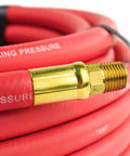 Close-up of Heavy Duty 50 Foot Rubber Air Hose Packed With 3 8 Inch Bore And Machined Brass One Quarter Male Npt Couplings.