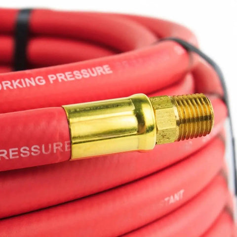 Close-up of Heavy Duty 50 Foot Rubber Air Hose Packed With 3 8 Inch Bore And Machined Brass One Quarter Male Npt Couplings.